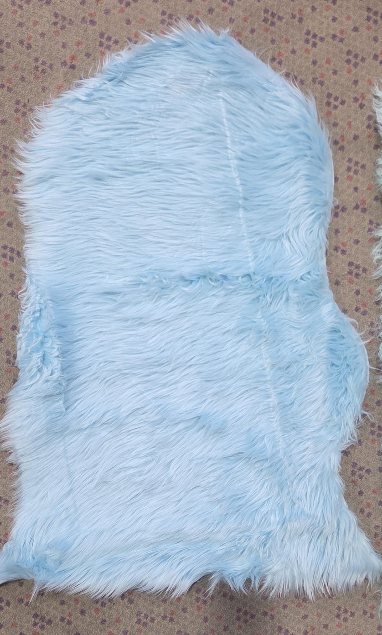 Blue faux fur rug.