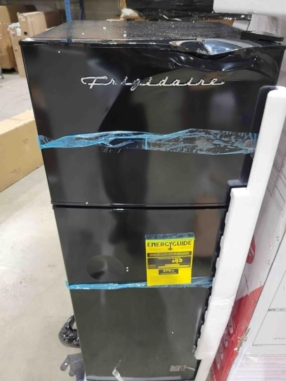 Frigidaire 7.5 Cu Ft Refrigerator with Top Freezer and chrome handles -22.4"D x 21.5"W x 55"H (Black)